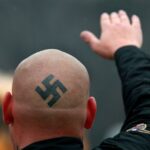 Nazi logo tattoo on a man's head and as the featured image of "mental illness/impairment murder case" blog.
